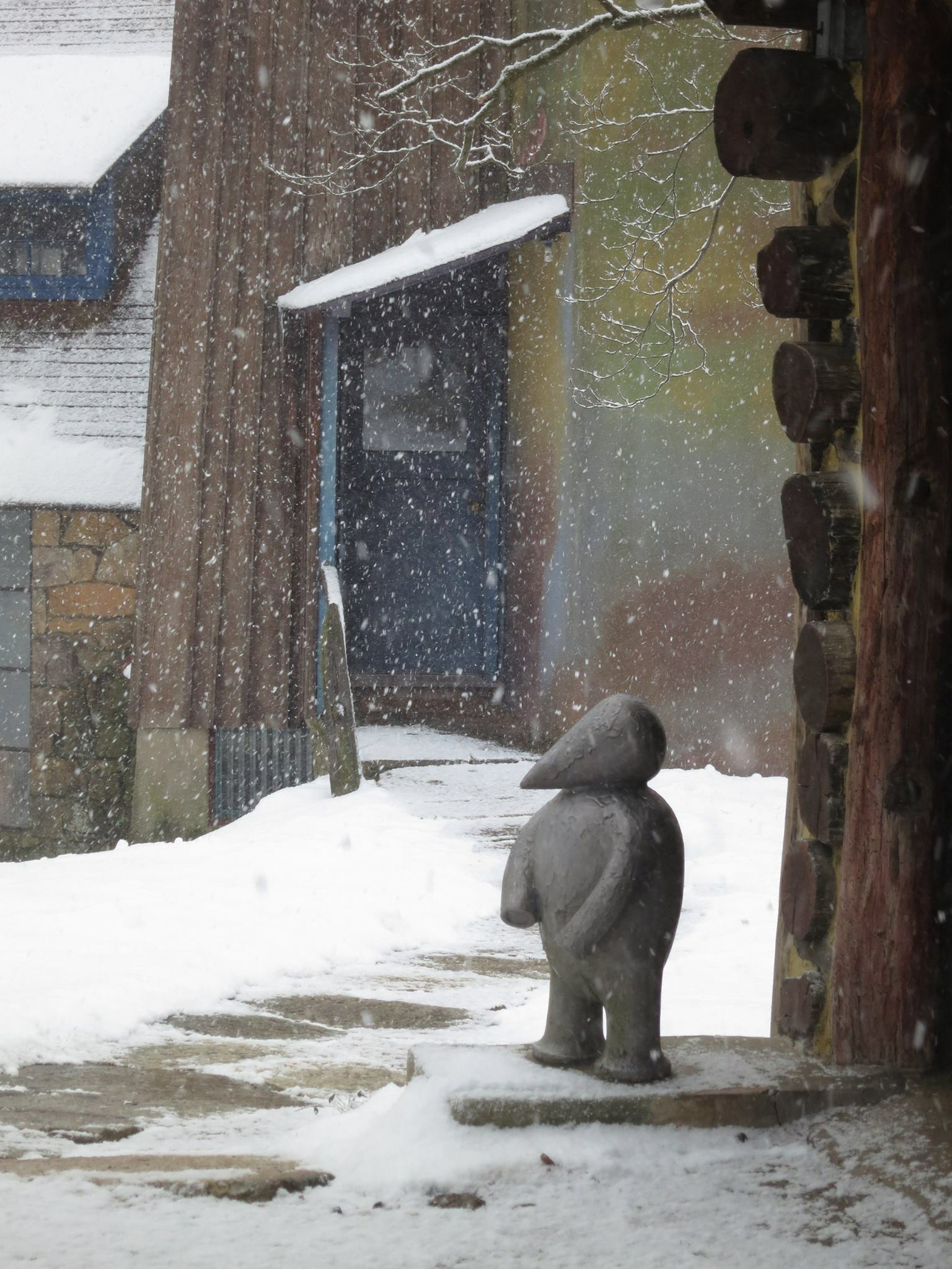 Cast aluminum version of Winnie (Winnie-the-Pooh) watches the seasons come and go. The original ceramic Pooh was a collaboration between Wharton Esherick and Peter McAdam in 1930. 