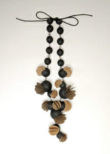 necklace with round wood balls and fanning petals