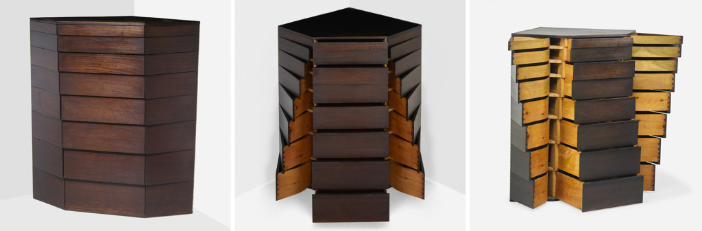 three views of dark three-sided corner cabinet with a series of symmetrical drawers pulled out to varying degrees.