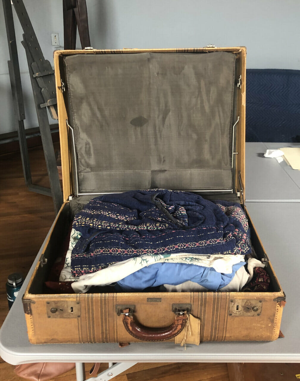 Suitcase filled with weaving samples from Wharton's wife, Letty